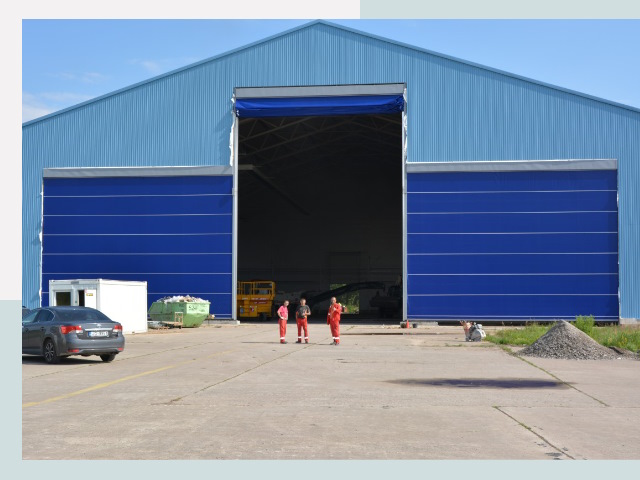 Ангарные ворота в Новокузнецк от СтальСтрой-Нвк по цене 616 руб.